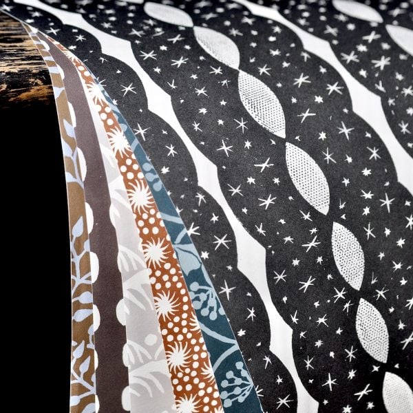 A selection of neutral patterned papers by Cambridge Imprint