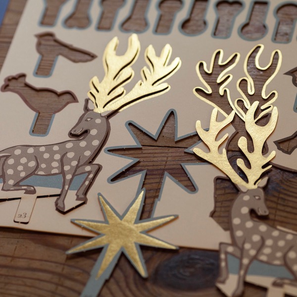 Cambridge Imprint Advent Calendar Deer and Star Decorations