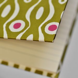 Detail of Large Hardback Notebook in Persephone Bright Olive and Cool Pink