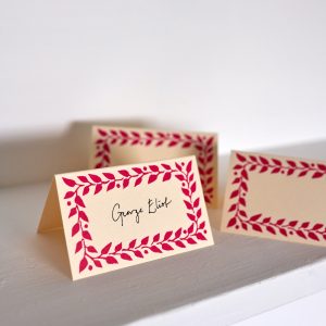 place cards with raspberry border