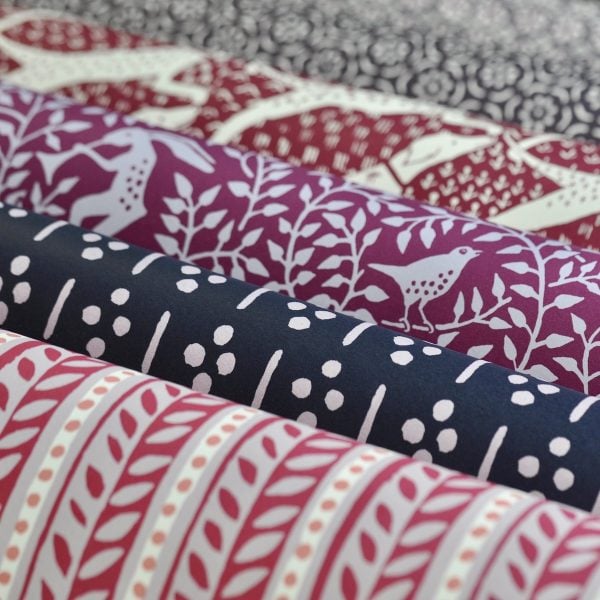 A selection of purple patterned papers by Cambridge Imprint