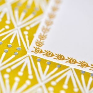 Closeup on Cambridge Imprint Long Labels in Mustard