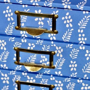 A Flight of Enid Marx’s Necktie-Covered Collector’s Drawers