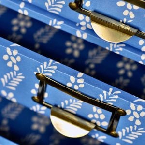A Flight of Enid Marx’s Necktie-Covered Collector’s Drawers