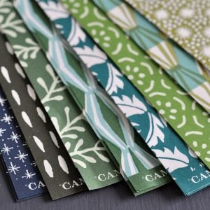 an assortment of patterned papers