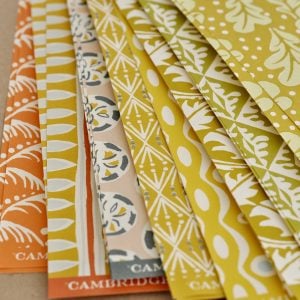 an assortment of patterned papers