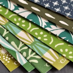 an assortment of patterned papers