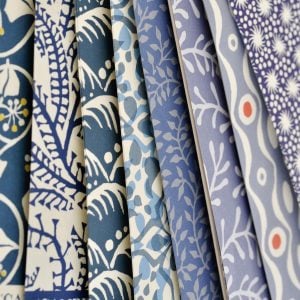 an assortment of patterned papers